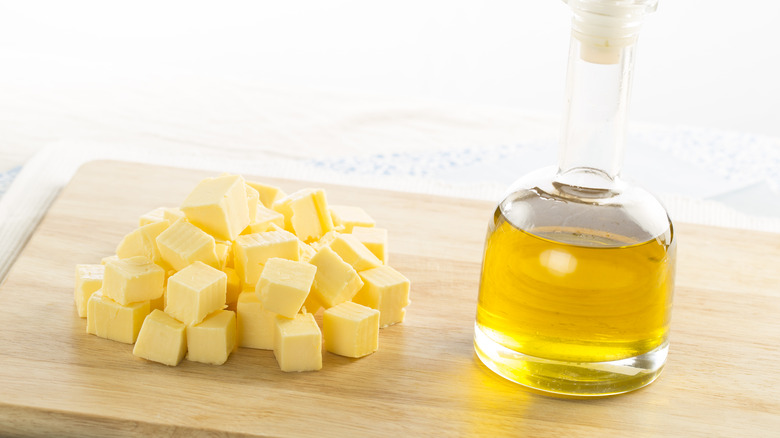 bottle of oil and cubes of butter