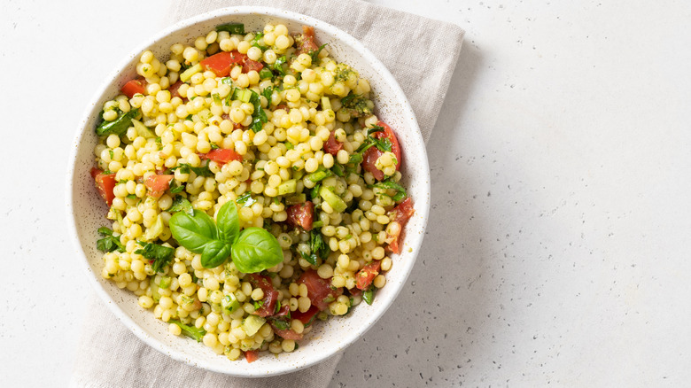 pearl couscous with tomatoes and herbs