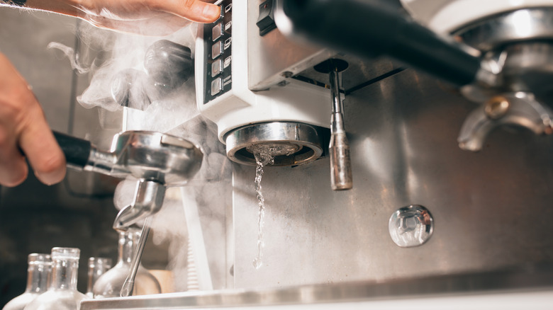 Purging water from coffee machine