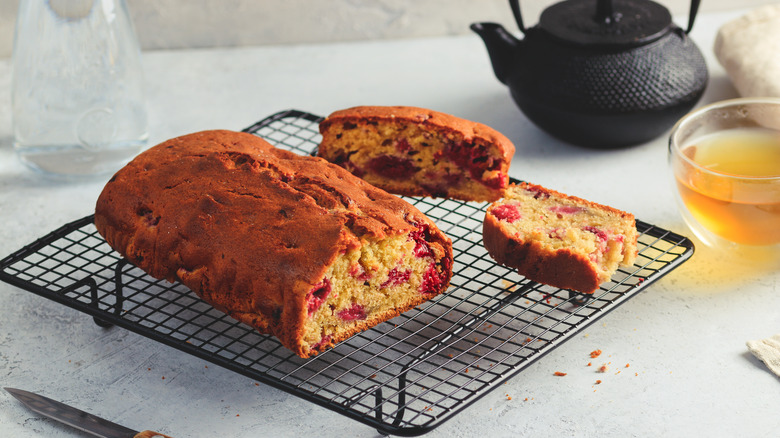 Raspberry fruit cake cooling on a rack