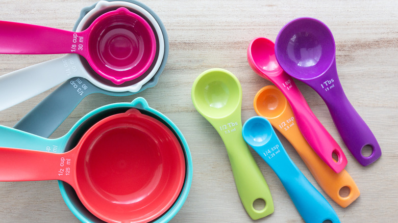 Set of colorful measuring cups and measuring spoons