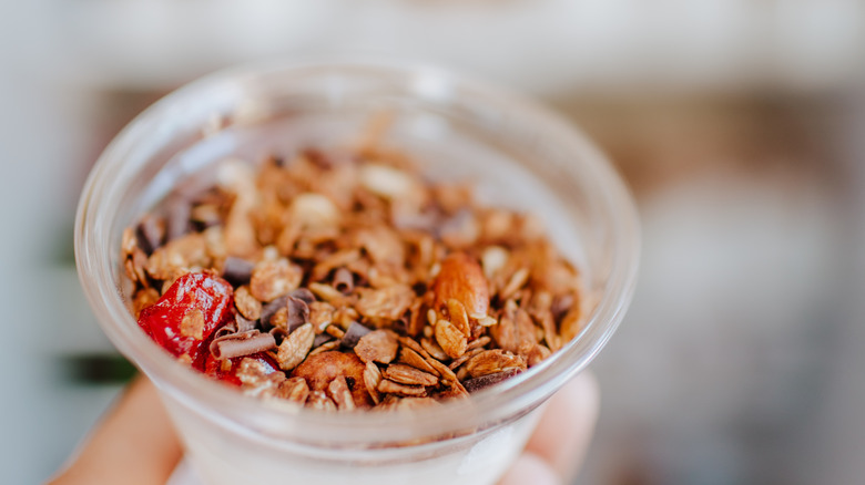 Chocolate granola yogurt in refrigerator