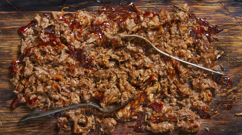 Pulled pork on cutting board