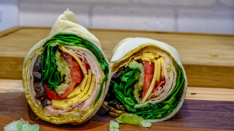 Wrap with vegetables, cheese, and meat