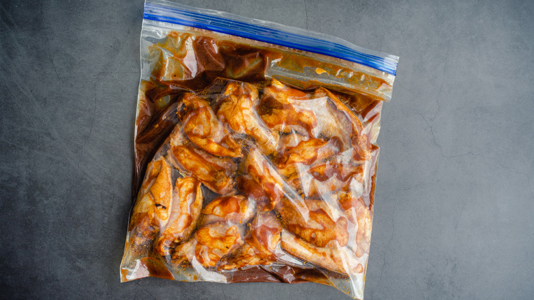 Raw chicken in ziplock bag