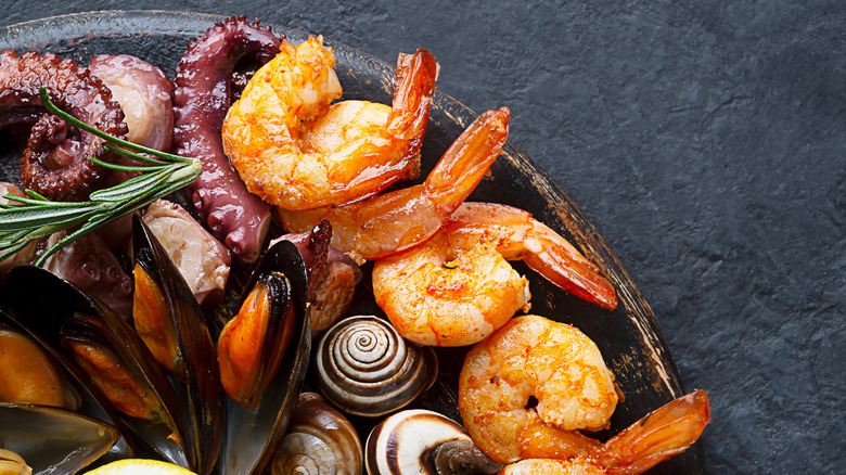 platter with cooked shrimp, octopus, and mussels