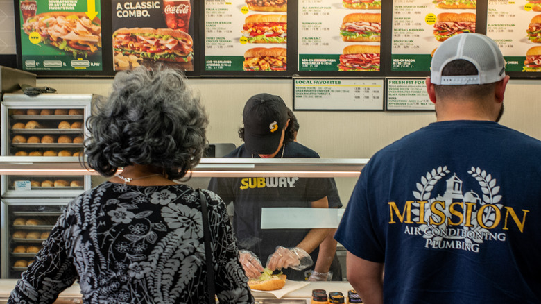 waiting in line at Subway