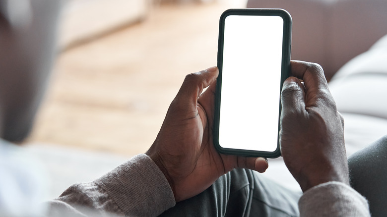 person holding phone