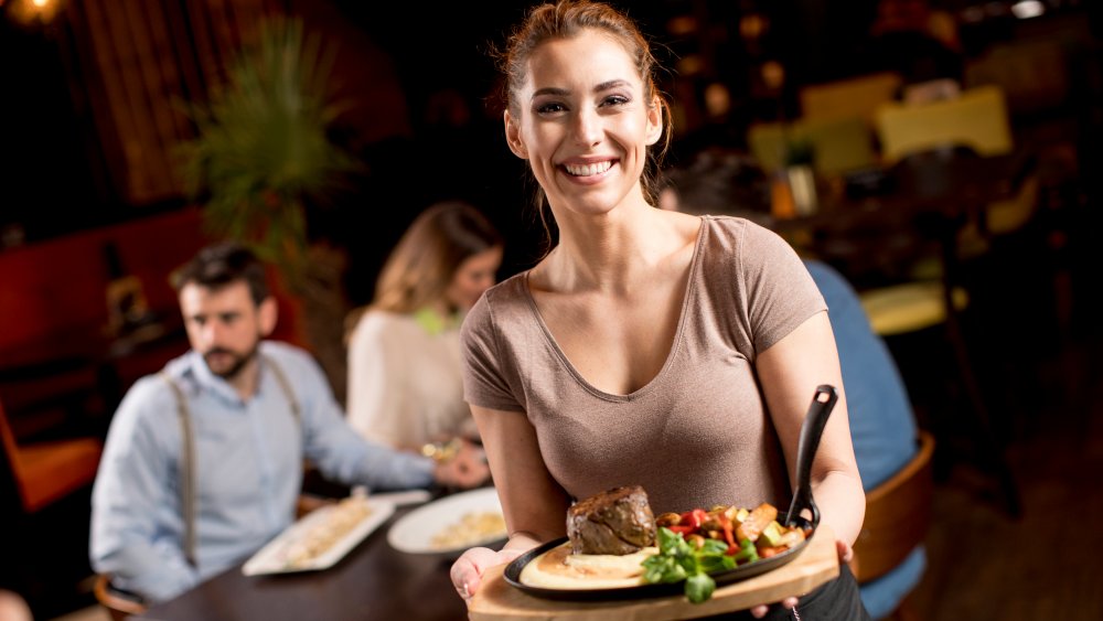 Server delivers steak order