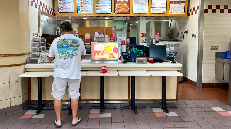 Man ordering at Wendy's