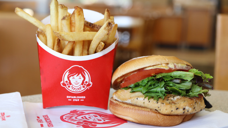 Wendy's fries and chicken sandwich on a table