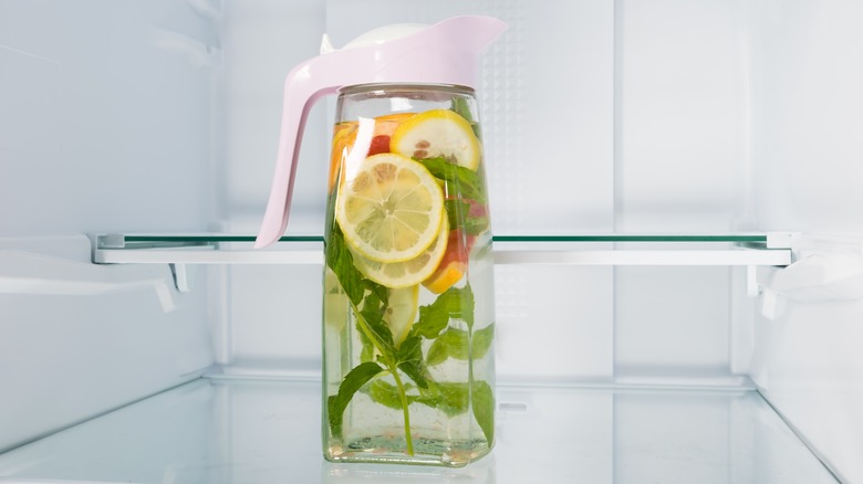 Carafe of iced tea in refrigerator 