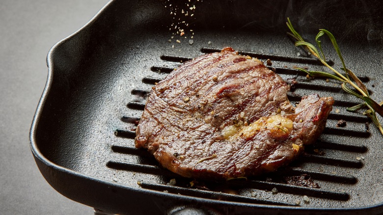 steak in a frying pan