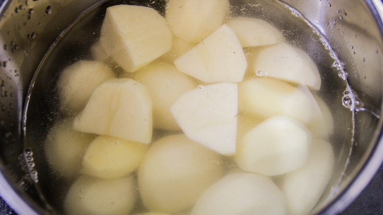 potatoes boiling in pot