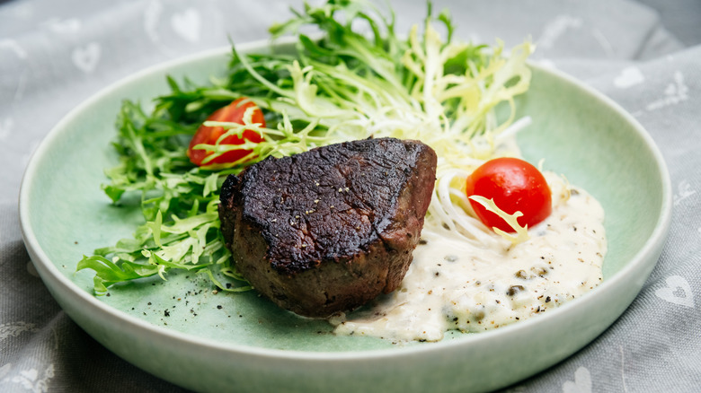 burnt steak on a salad 