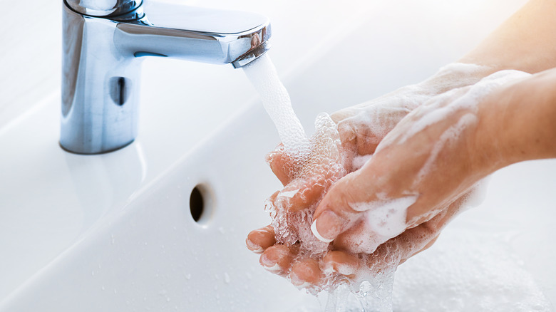 woman washing hands