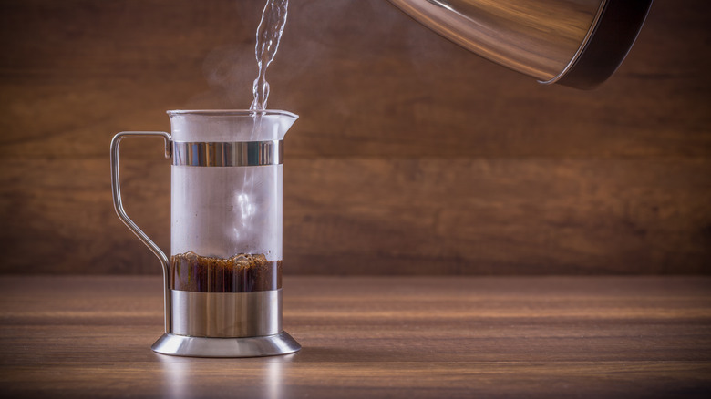 water being poured into French press