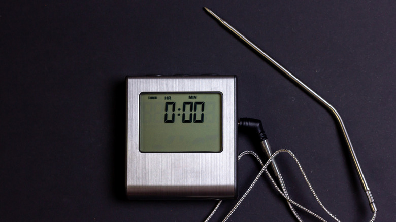 Meat thermometer with probe on a cord