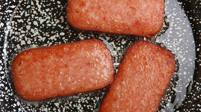 Spam and oil in pan