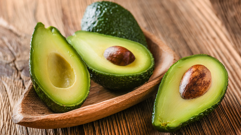 Sliced avocados in a bowl