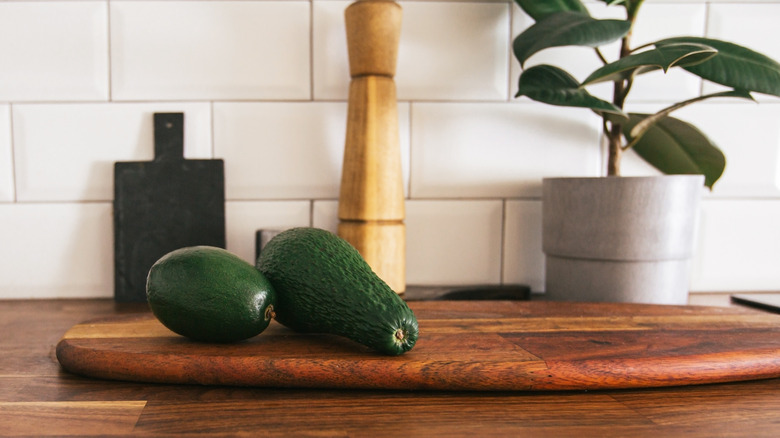 Avocados on counter top