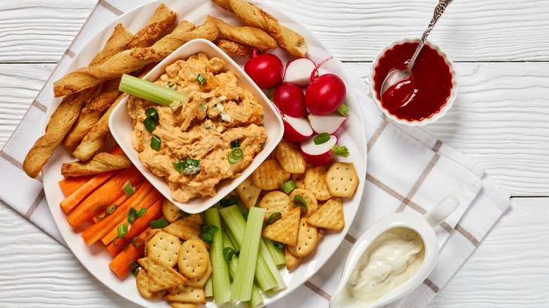 Buffalo chicken dip with dipping items