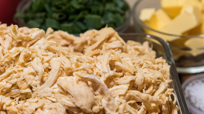 Casserole filled with shredded chicken