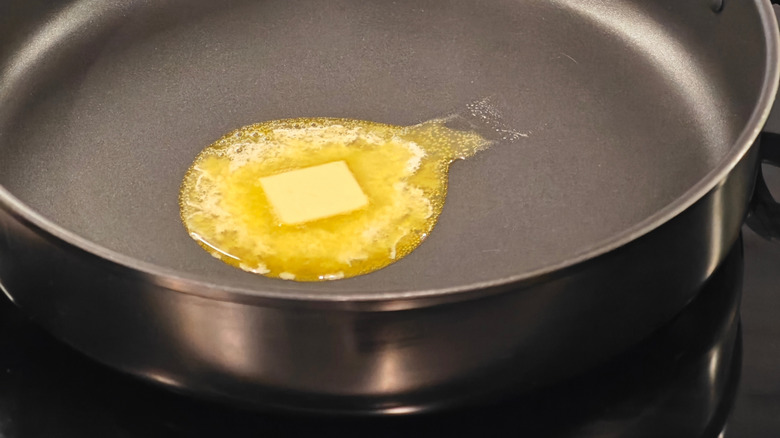 butter melting in skillet