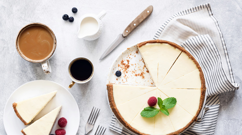 sliced cheesecake with coffee