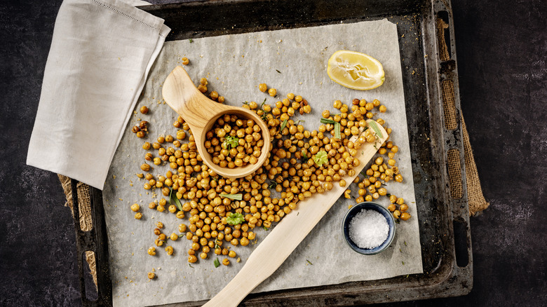 baking tray of roasted chickpeas with salt and lemon