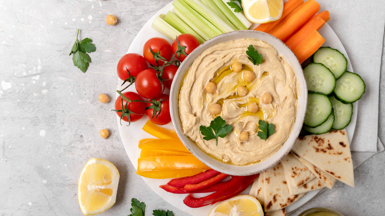 plate of hummus and crudites