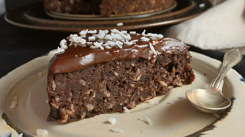 Cake with coconut milk ganache on plate