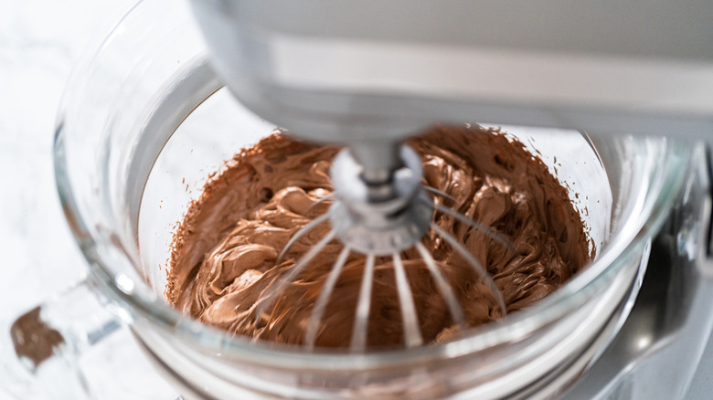 Whipped chocolate ganache in mixer