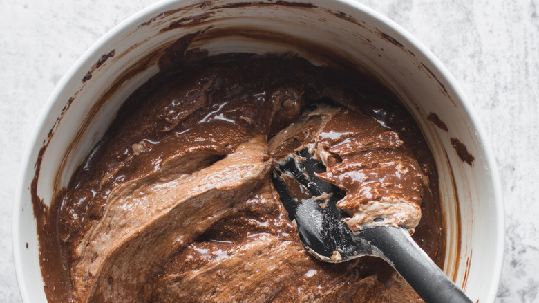 Folding chocolate cake batter