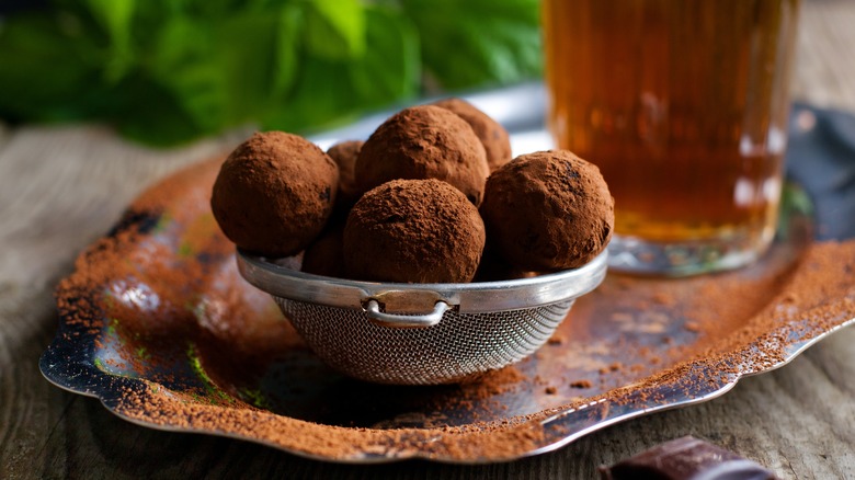 truffles with drink in glass