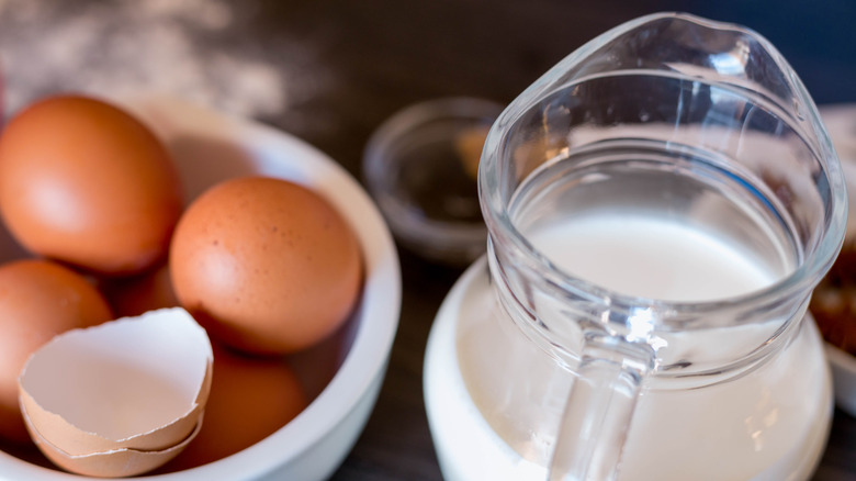 bowl of eggs and jug of milk