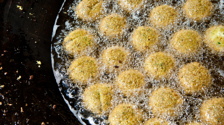 falafel frying in pan