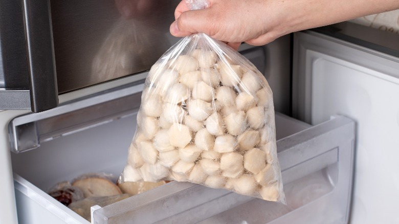 bag of frozen dumplings in freezer