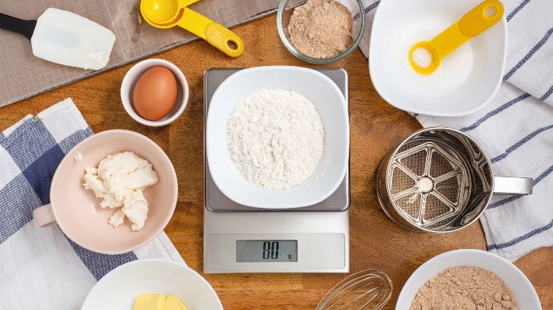 digital kitchen scale with baking supplies 