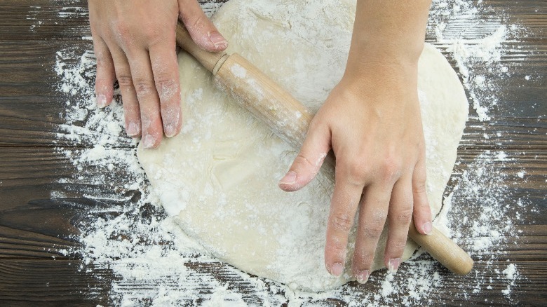 dough stretched with rolling pin