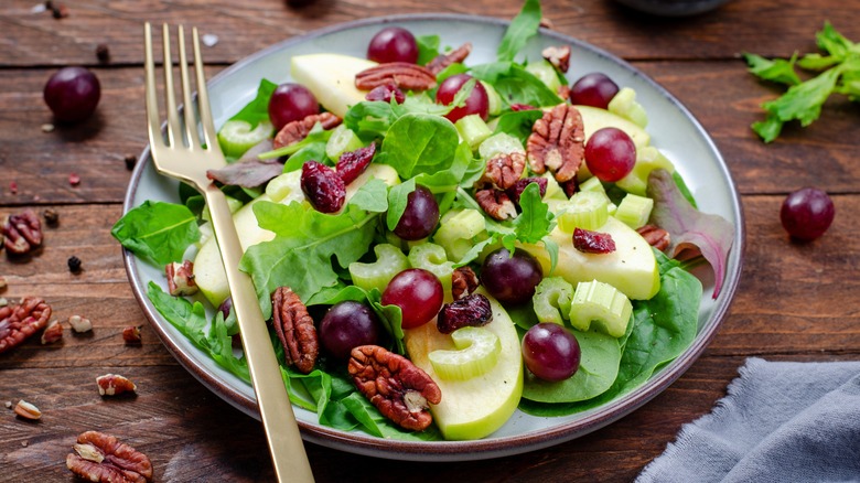 salad with grapes, apples, greens, and pecans