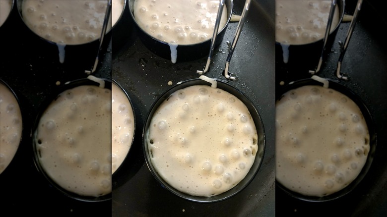 Crumpets being cooked