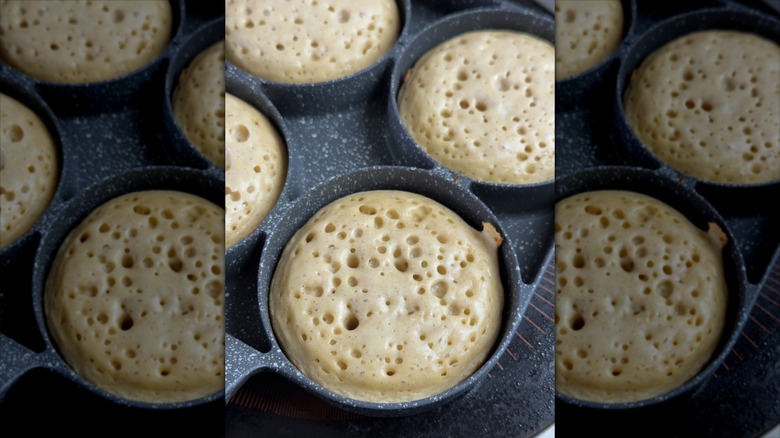 Crumpets cooking in rings