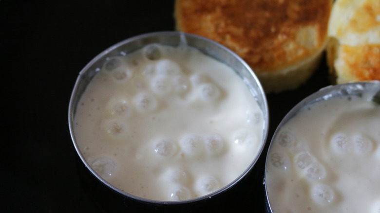 Crumpets cooking in rings