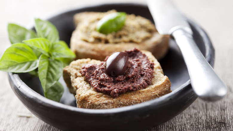 tapenade on toast with olives