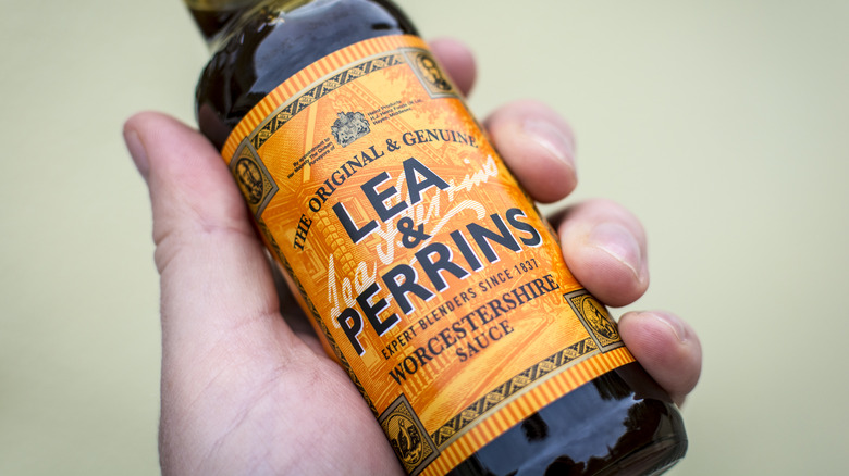 Handheld bottle of Worcestershire sauce