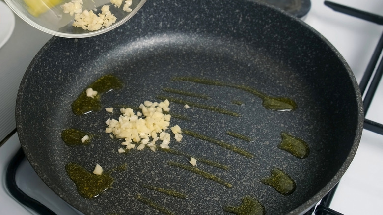 Garlic cooking in pan