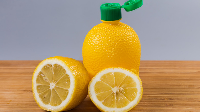 Bottled lemon juice and halved lemons