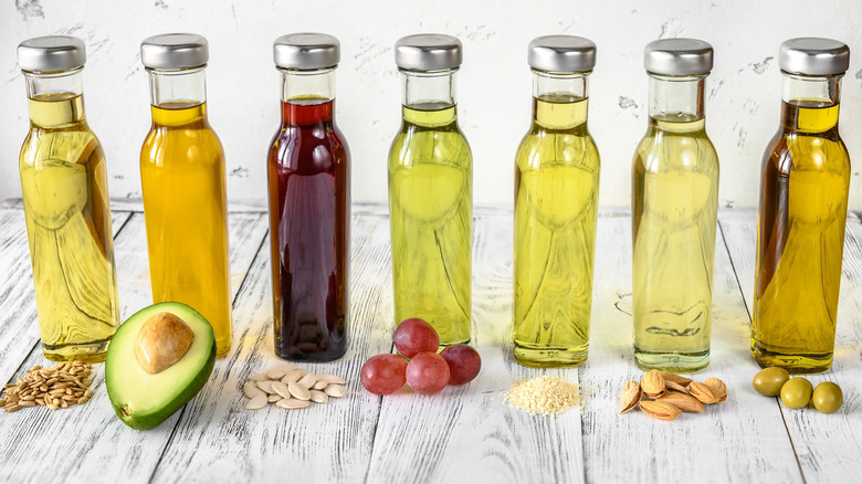 various oils in glass bottles