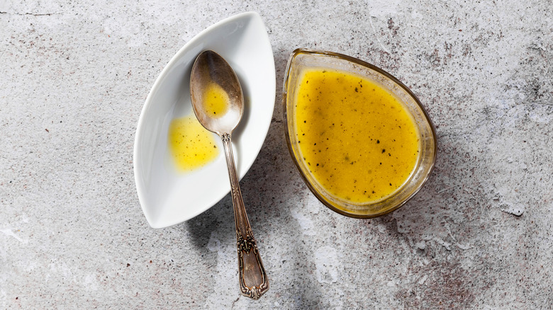 Salad dressing bowl and spoon